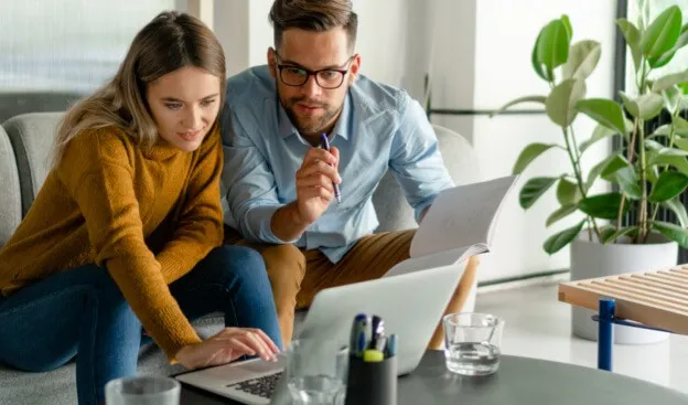 Estimate (2) Couple looking into laptop | LMK Floors